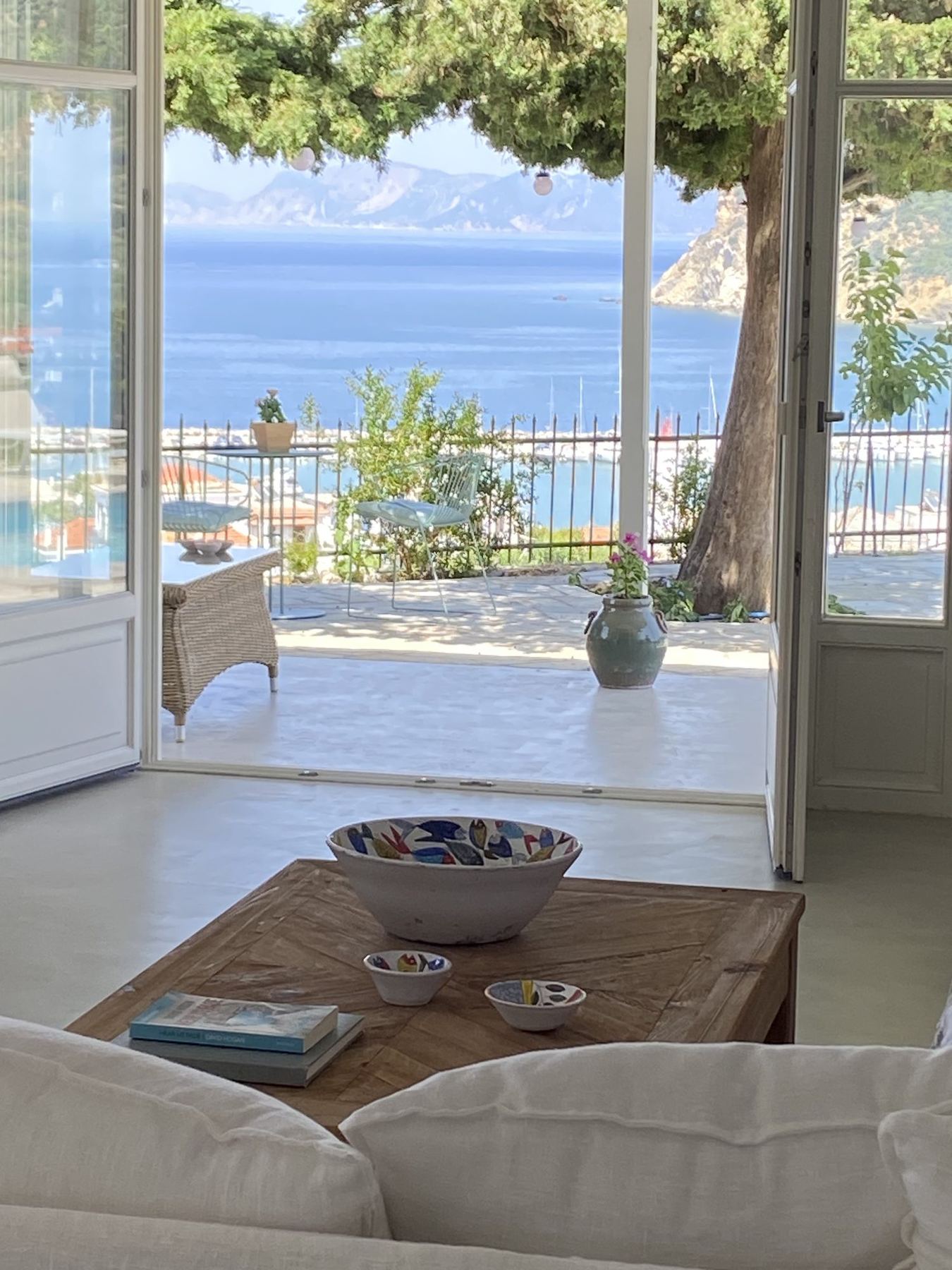 The view from the sofa, out through the doors to the Aegean