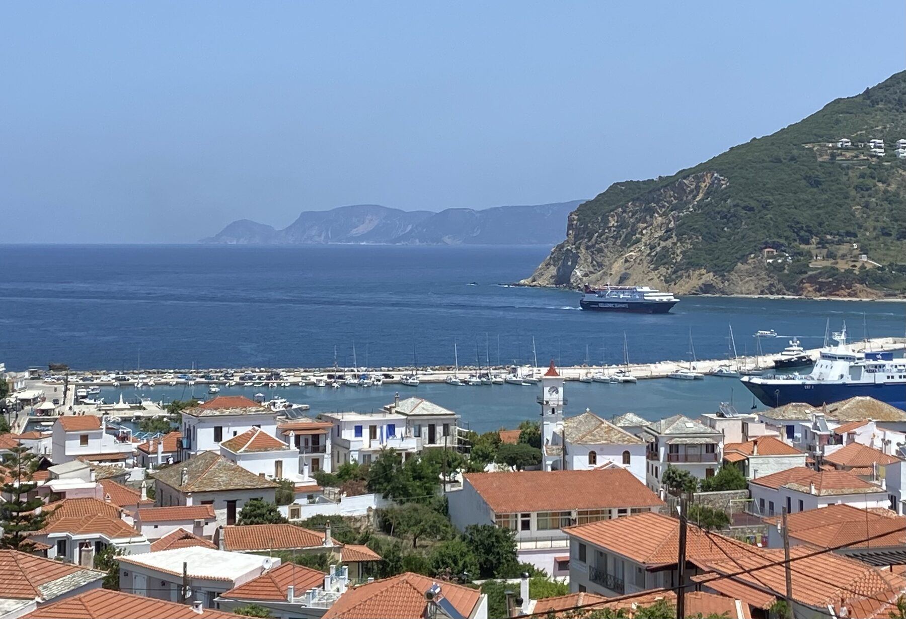 Skopelos Town and its harbour, with a ferry coming in